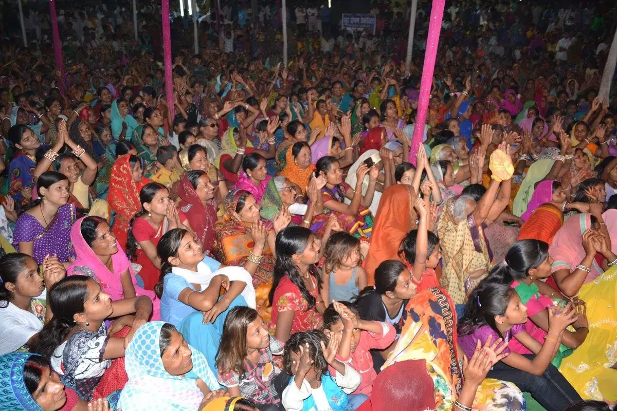 Devotees praying during Bhagwat Katha discourse
