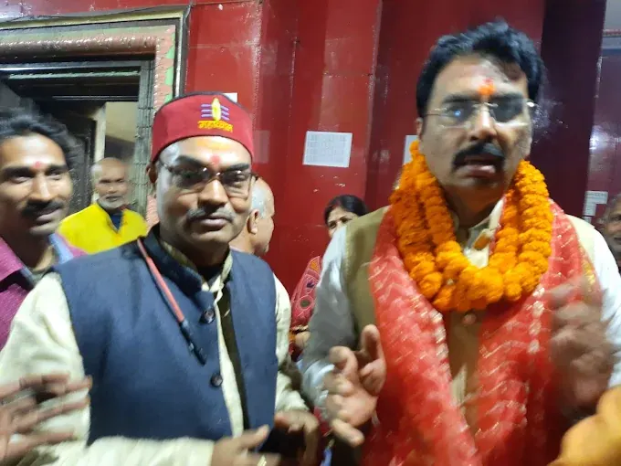Dr. Dadhichy performing puja with city MLA